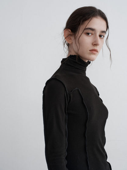 Eliraya slim-fit cowl neck knit top for women, featuring ruffle details and a layered design, ideal for winter layering and styling.