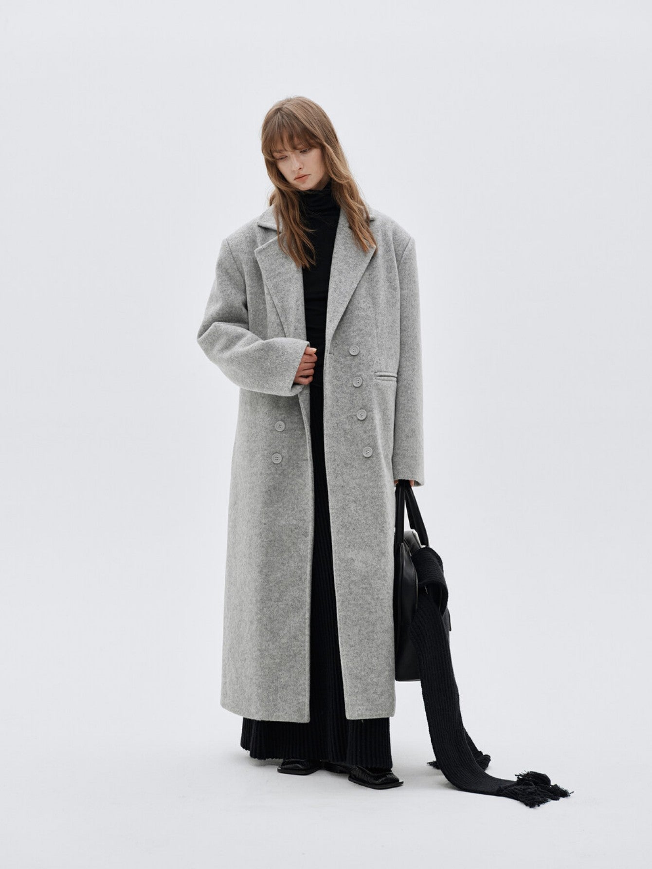 Eliraya double-breasted wool coat for women, featuring a gray long-line design for a classic, tailored winter overcoat look.