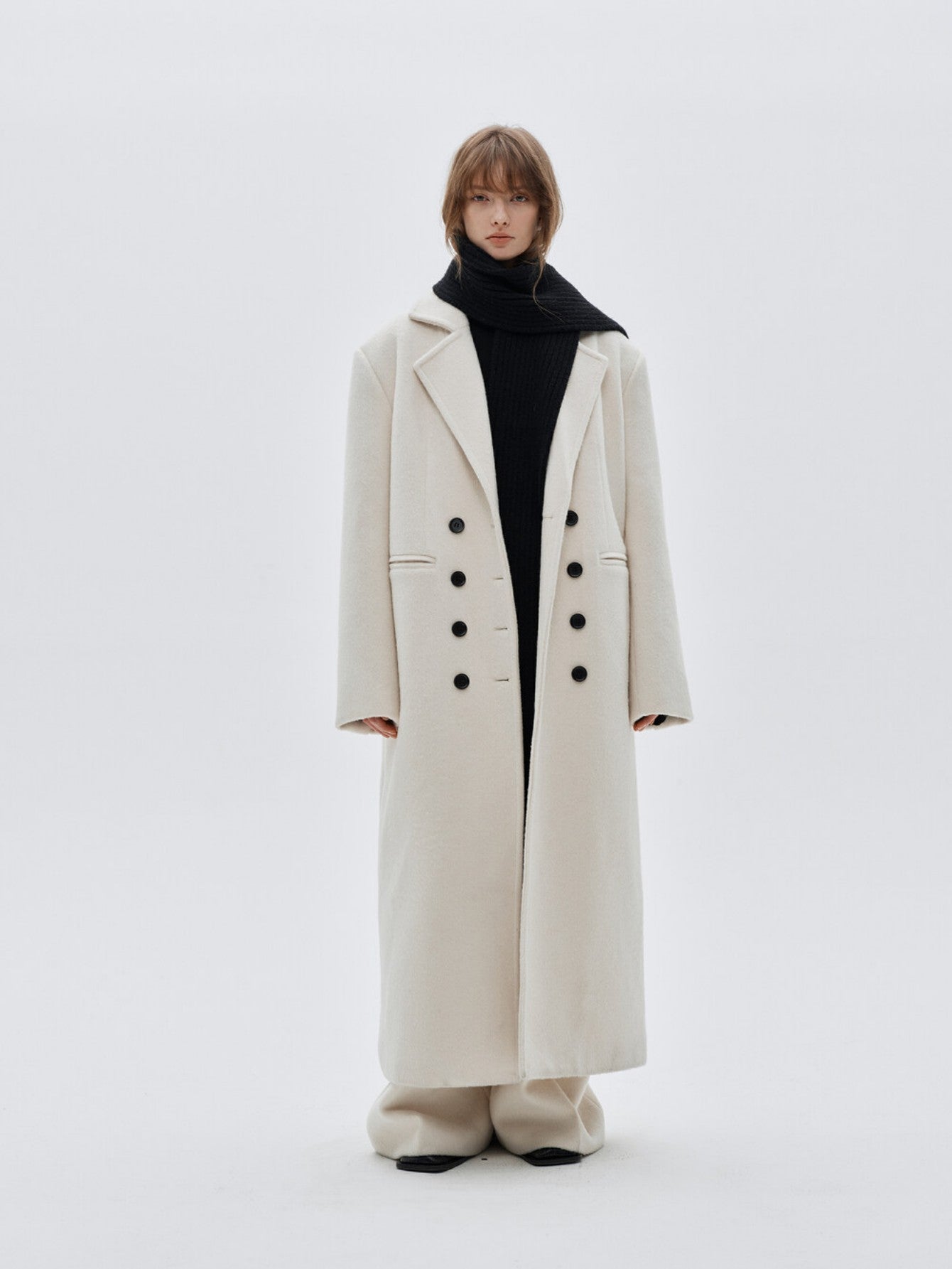 Eliraya double-breasted wool coat for women, featuring a gray long-line design for a classic, tailored winter overcoat look.