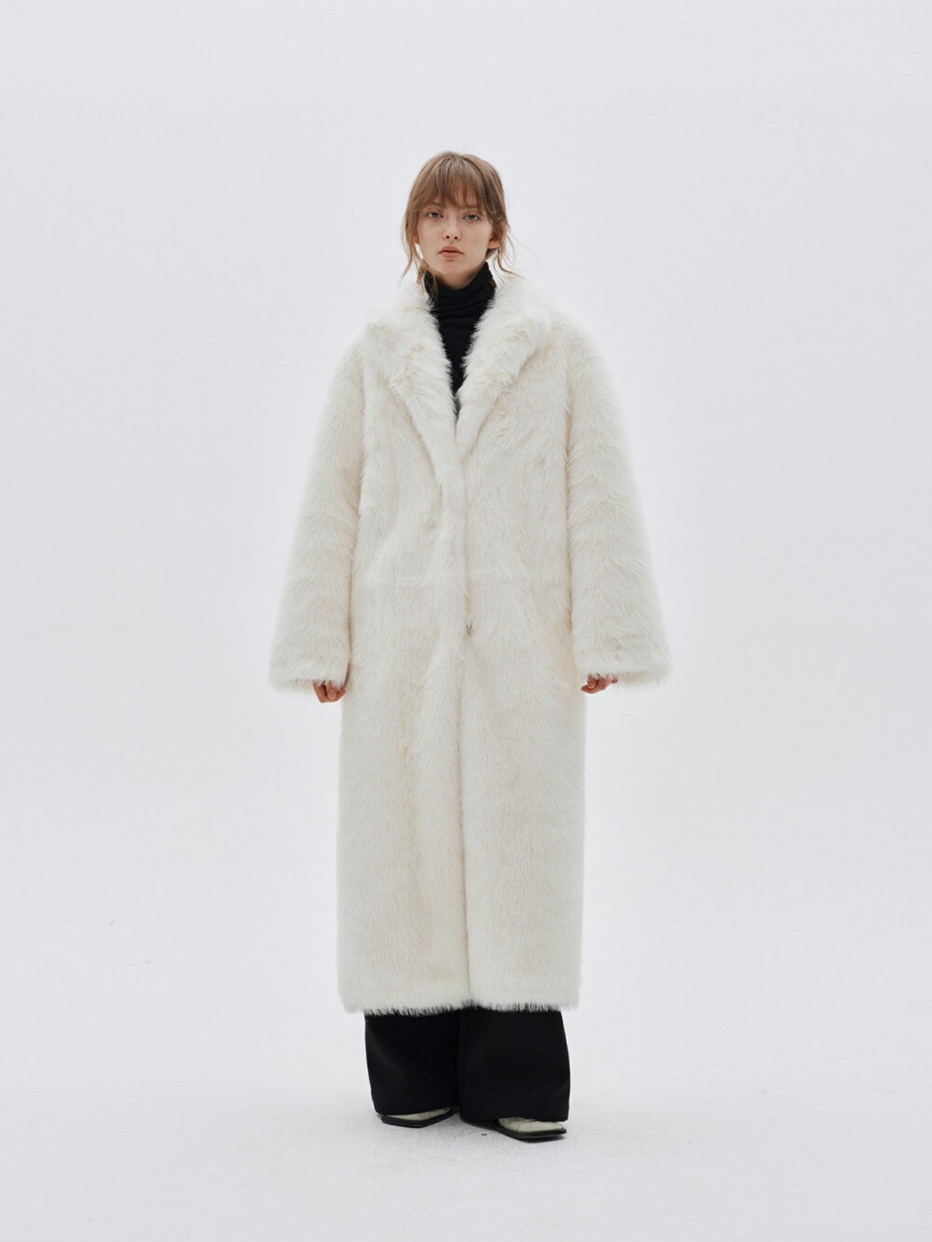 Eliraya faux fur coat for women, featuring an elegant fox fur-inspired design, perfect for winter warmth and luxurious styling.