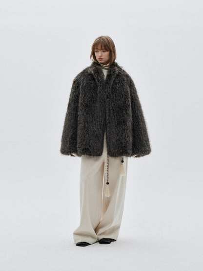 Eliraya faux fur short jacket for women, designed with a high-neck and red fox fur inspiration for a chic winter look.