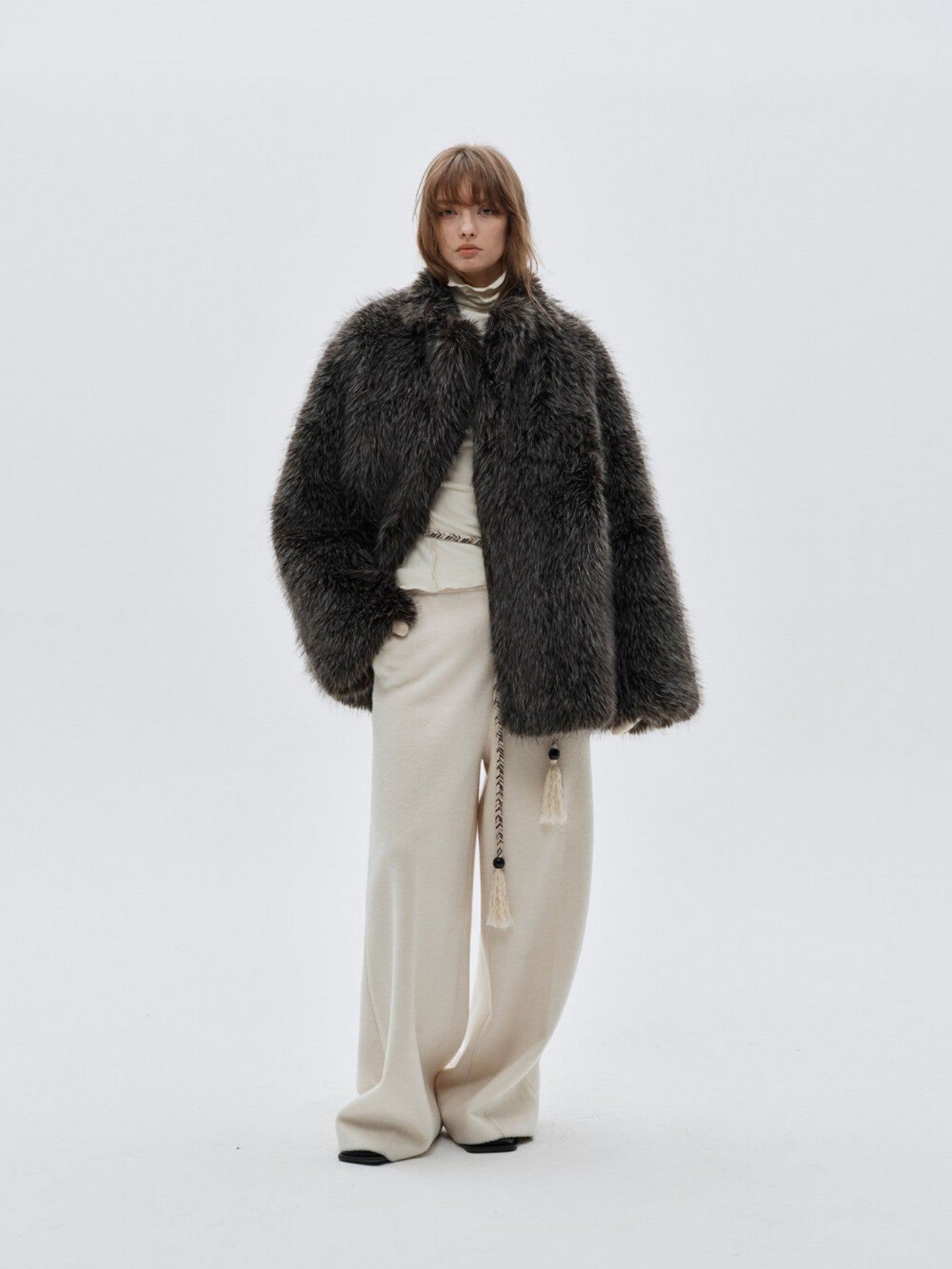 Eliraya faux fur short jacket for women, designed with a high-neck and red fox fur inspiration for a chic winter look.