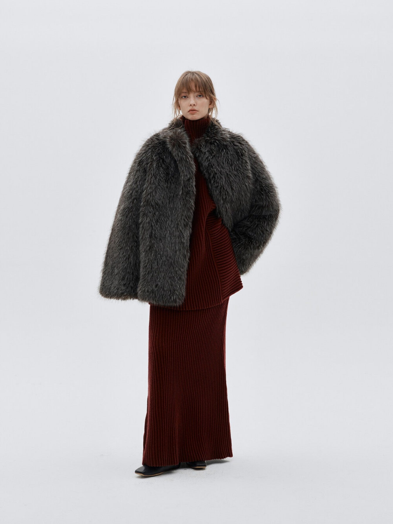 Eliraya faux fur short jacket for women, designed with a high-neck and red fox fur inspiration for a chic winter look.