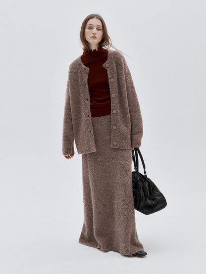 Eliraya French wool overcoat for women, featuring a belted design and high-neck collar for a warm, sophisticated winter look.