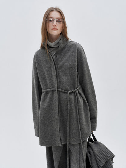 Eliraya French wool overcoat for women, featuring a high-neck and belted design for a warm, sophisticated winter look.