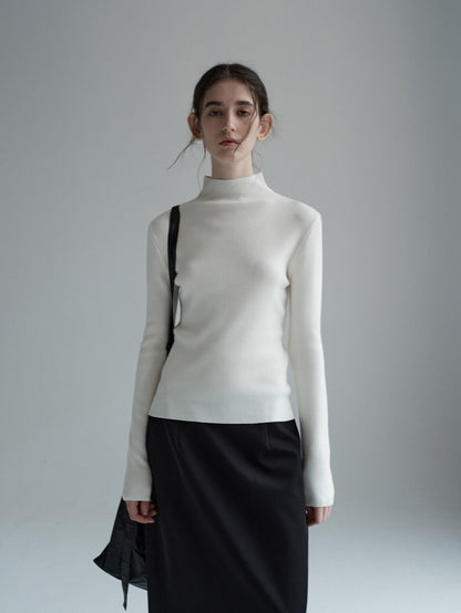 Eliraya half-turtleneck knit top for women, featuring a slim-fit design, ideal for autumn layering and offering both warmth and style.