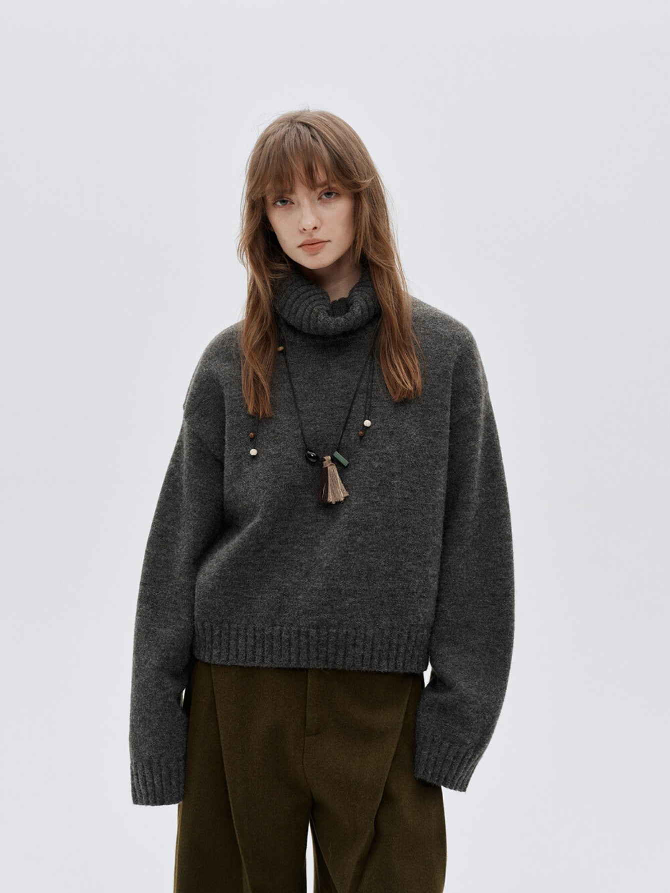 Eliraya cozy high-neck cropped sweater for women, designed for warmth and comfort with a thick knit perfect for winter layering.