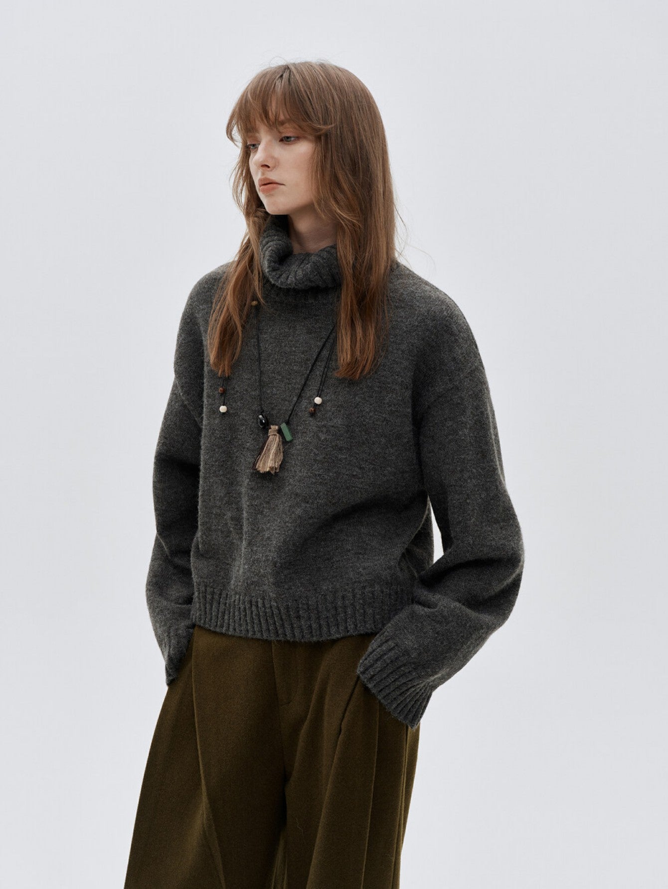 Eliraya cozy high-neck cropped sweater for women, designed for warmth and comfort with a thick knit perfect for winter layering.