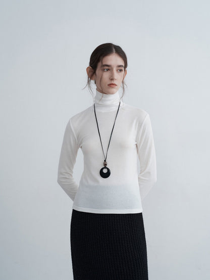 Eliraya slim-fit high-neck cowl sweater for women, featuring ruffle details and a flattering fit, ideal for autumn layering.