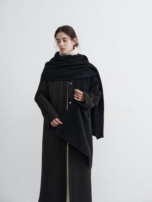 Eliraya oversized long puffer coat for women, featuring a loose fit and over-knee length, perfect for winter warmth and stylish comfort.