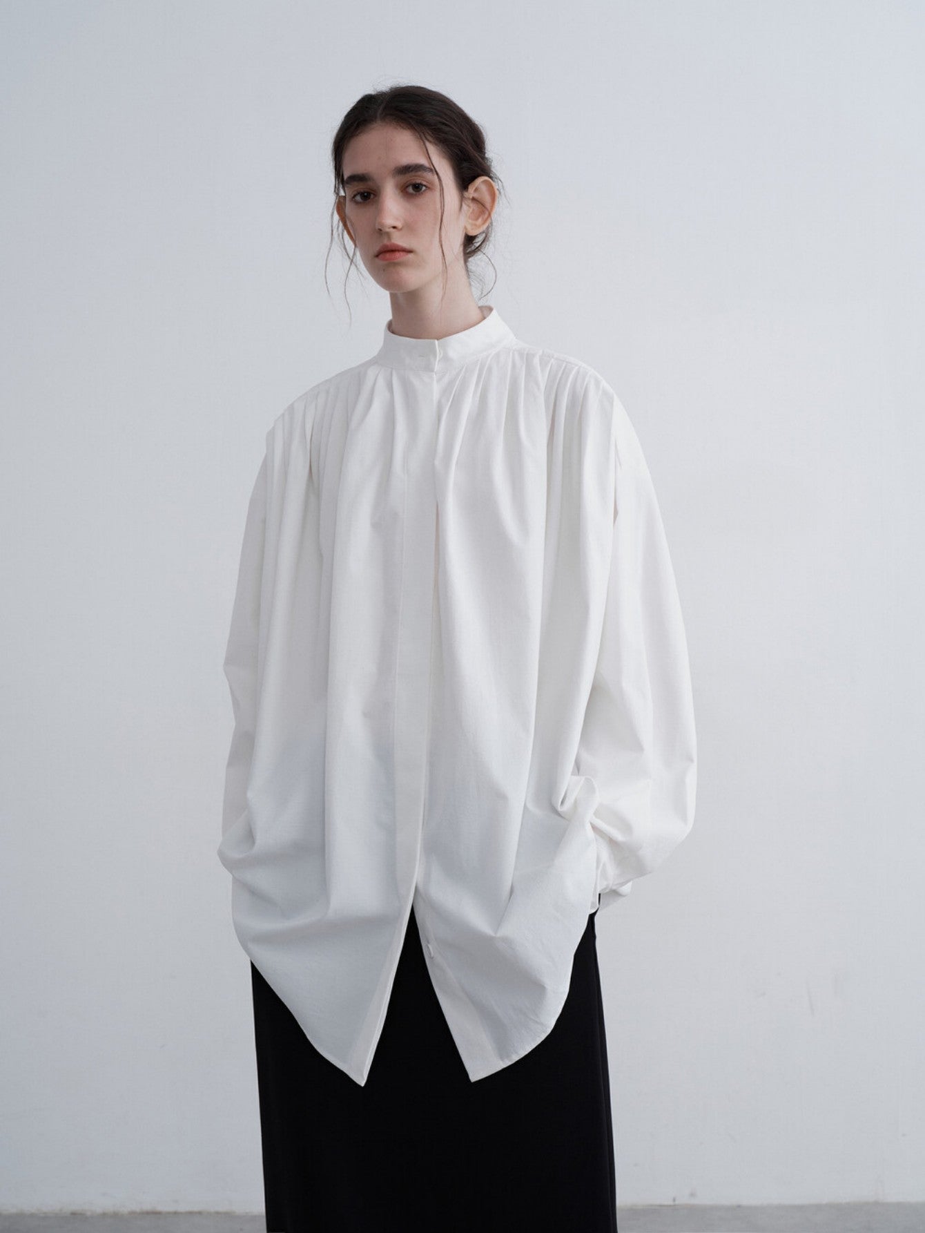 Eliraya pleated white blouse for women, featuring a draped collar and loose fit for an elegant French-style autumn look.