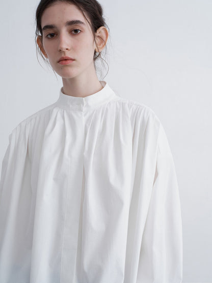 Eliraya pleated white blouse for women, featuring a draped collar and loose fit for an elegant French-style autumn look.