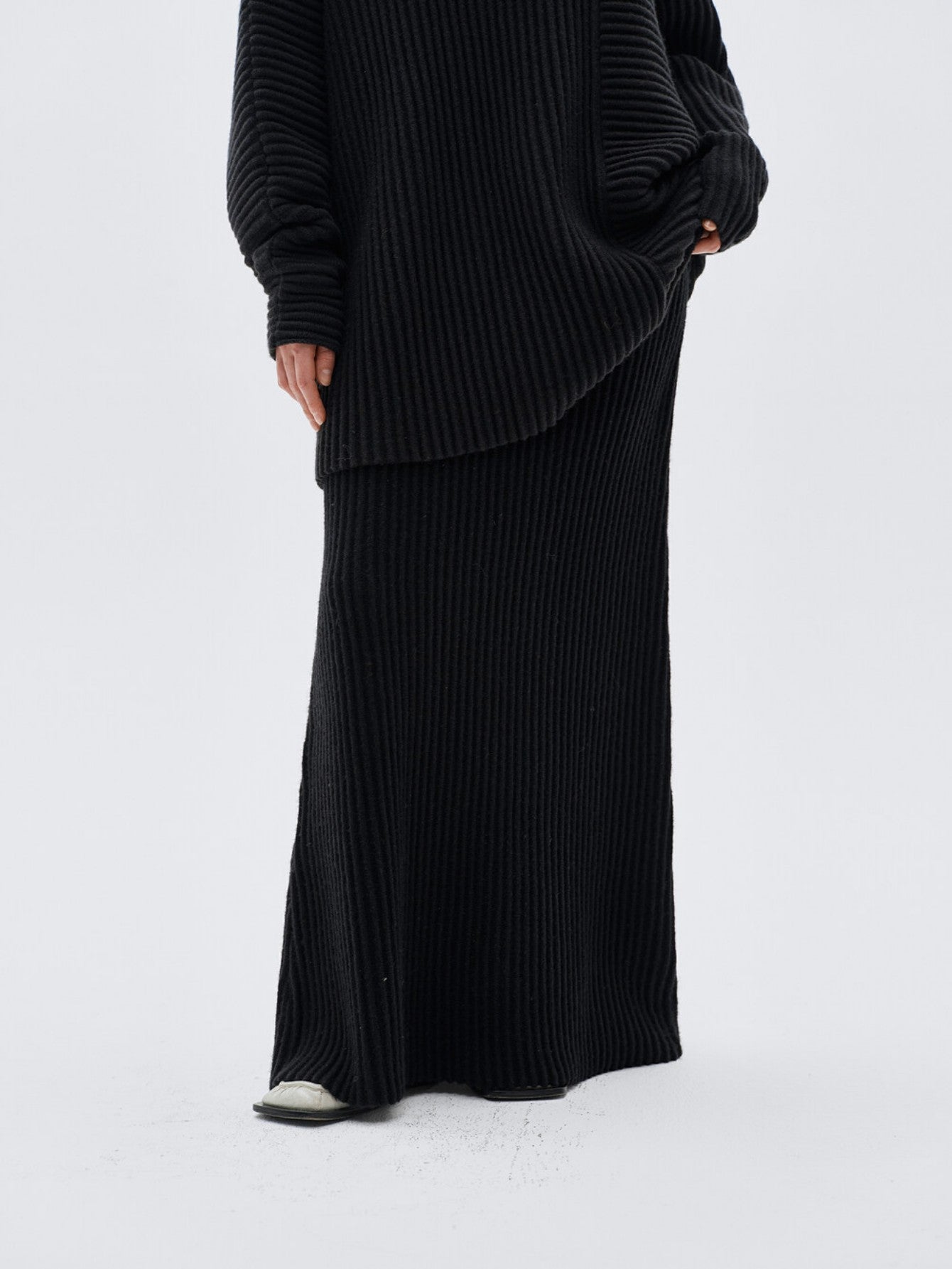 Eliraya ribbed knit maxi skirt for women, designed for winter with a straight-line fit, perfect for Christmas and stylish layering.