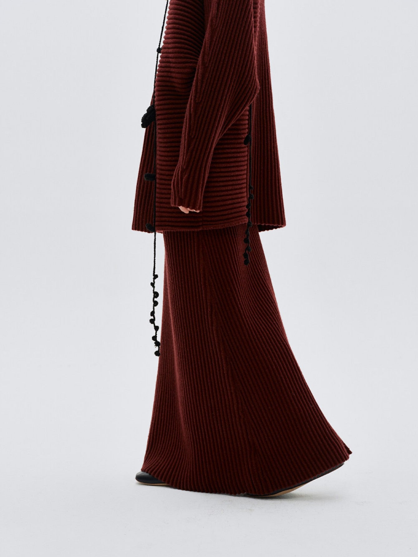 Eliraya ribbed knit maxi skirt for women, designed for winter with a straight-line fit, perfect for Christmas and stylish layering.