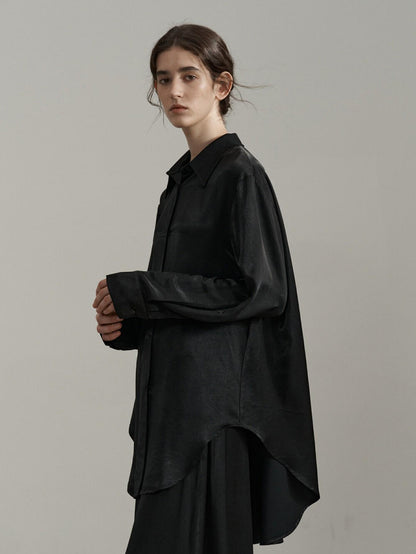 Eliraya satin midi shirt dress for women, featuring an asymmetrical design and long sleeves for an elegant, layered winter look.