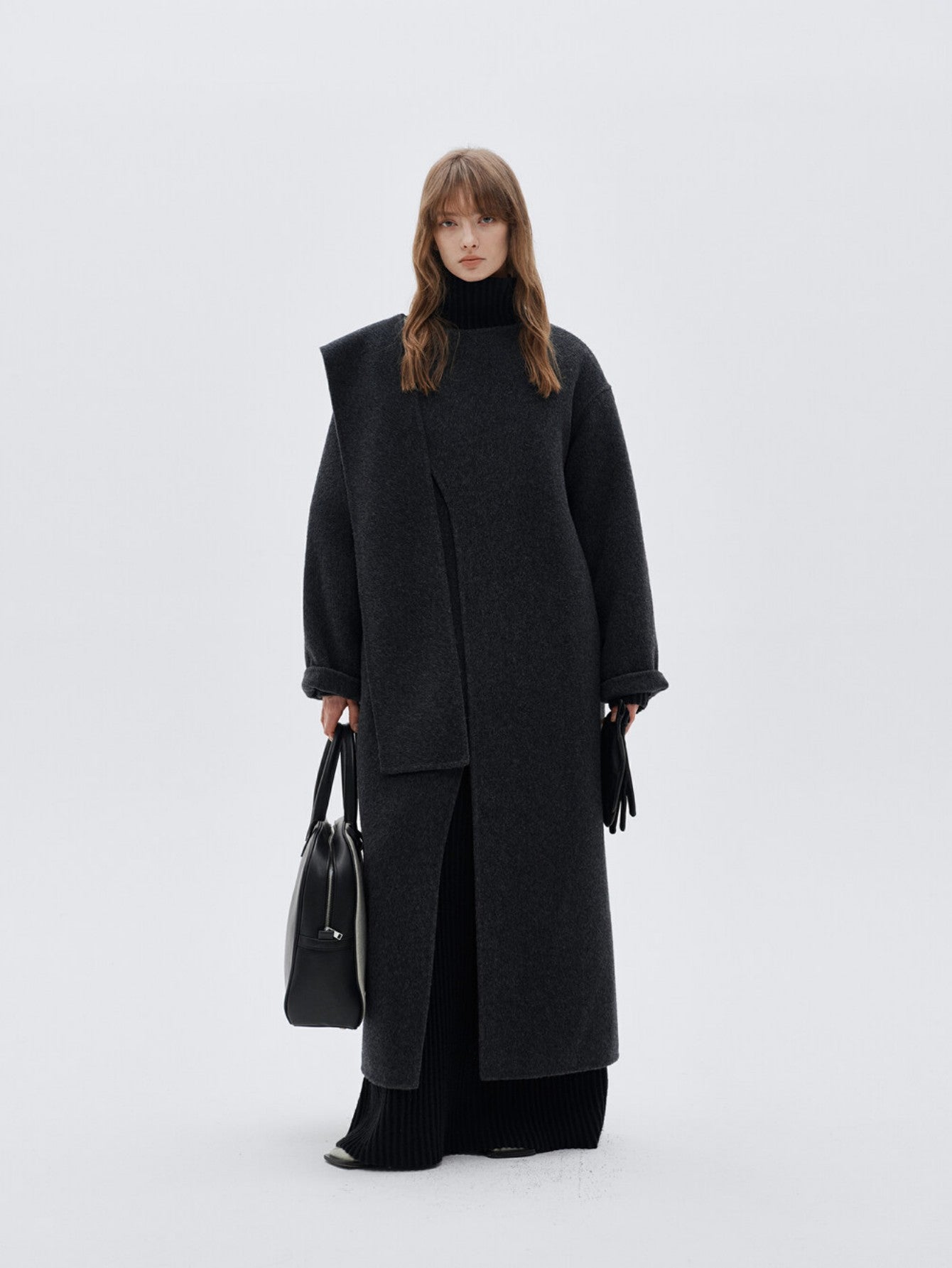 Eliraya wool scarf coat for women, designed with a double-sided wool fabric and a belt, perfect for winter warmth and elegant styling.